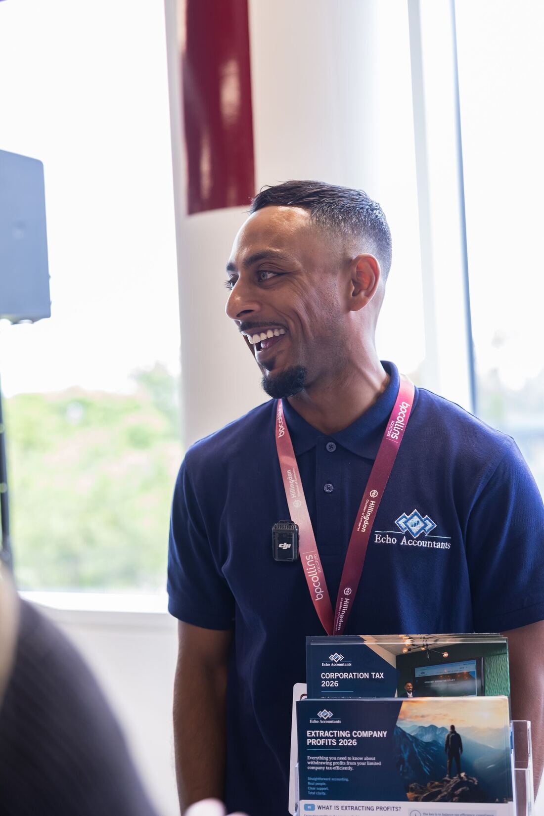 Joshua Dean talking to a visitor at the Hillingdon Business Expo